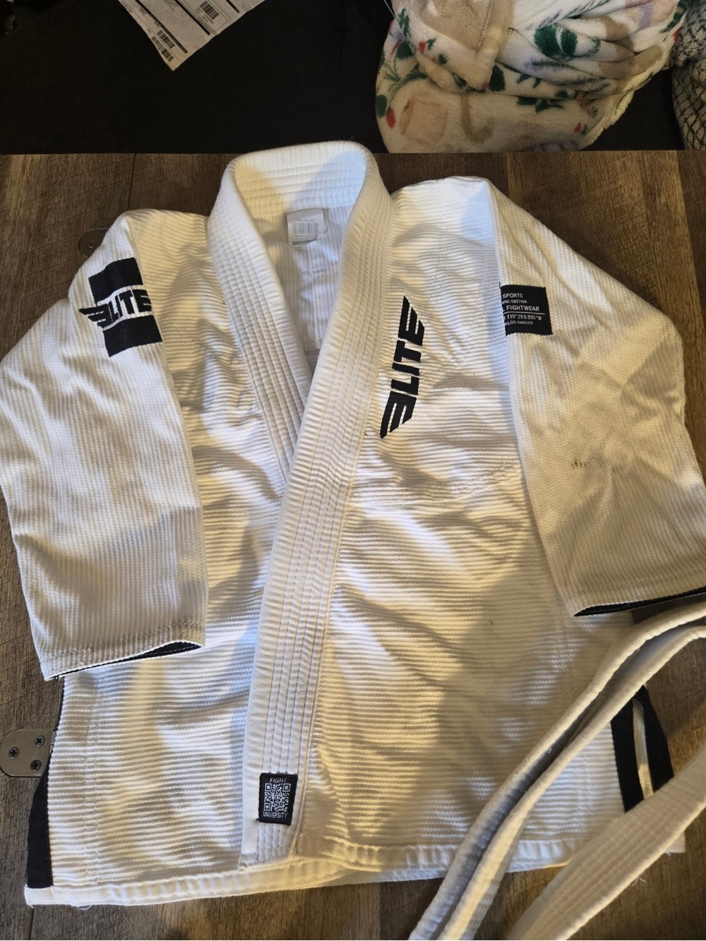 Elite White Brazilian Jiu-Jitsu Gi Jacket with Black Accents